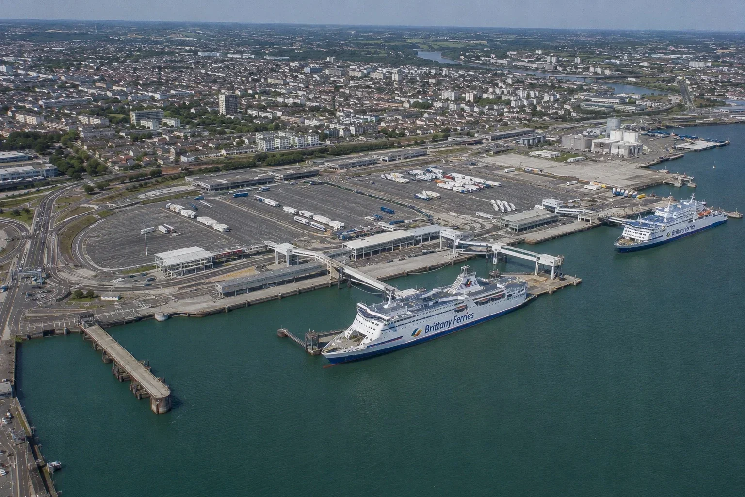 Aerial ferry terminal scene with Brittany Ferries ships serving the Portsmouth to Caen route